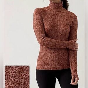 Athleta Flurry Seamless Turtleneck
Abstract Conch Pink, Size Large